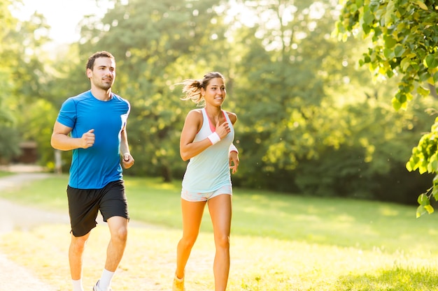 Young couple running