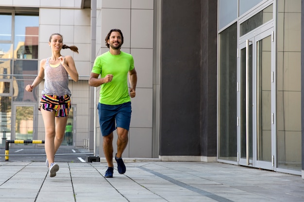 Young couple running