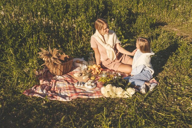 Young couple sitting in grass