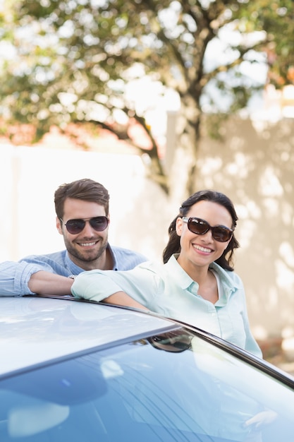 Young couple smiling at the camera