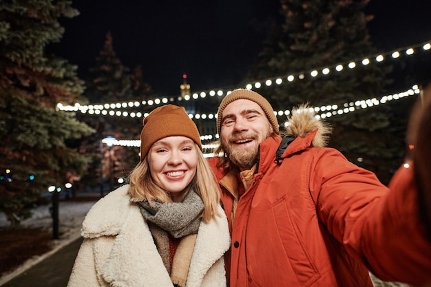 Young Couple Smiling At Camera