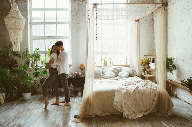 Young couple spending time in their beautiful countryside house