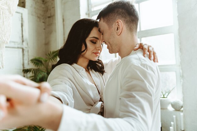 Young couple spending time in their beautiful countryside house