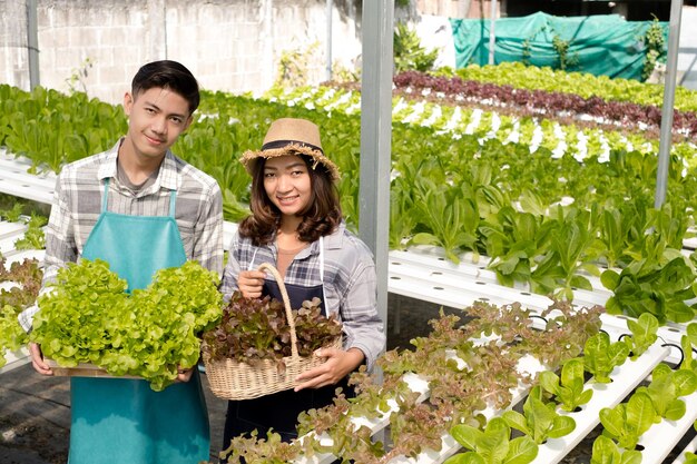 Young couple standing in a farm