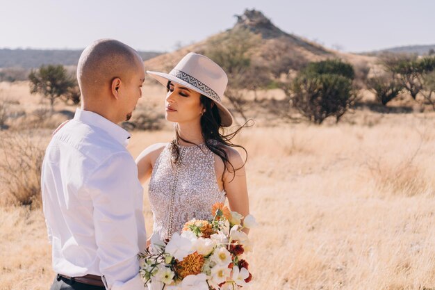 Photo young couple standing on land