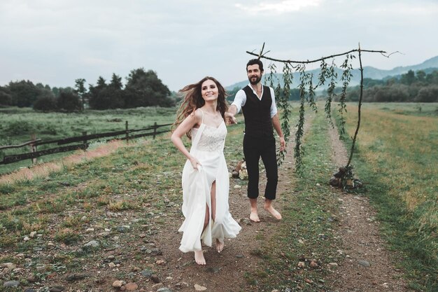 Photo young couple standing outdoors