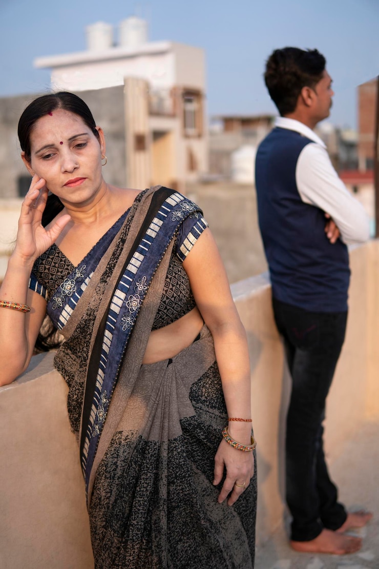 फोटो young couple standing outdoors