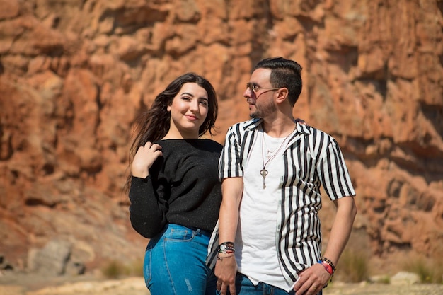 Young couple standing outdoors