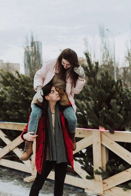 Young couple standing together outdoors