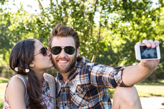 Young couple taking a selfie