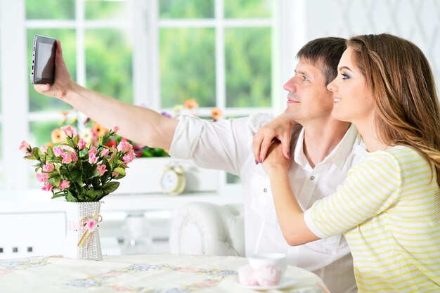 Young couple taking selfie