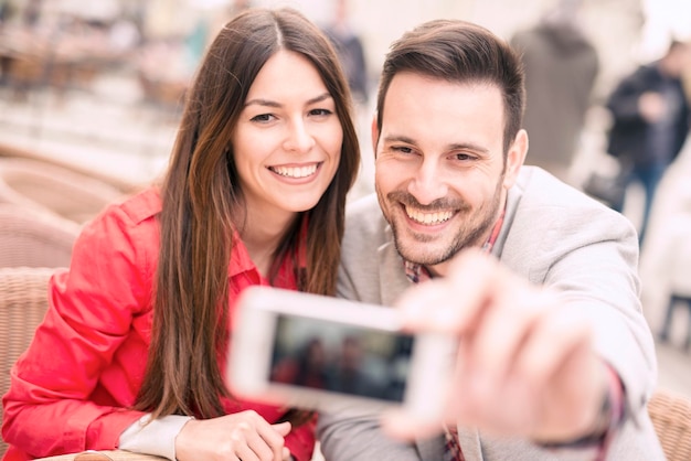 Young couple taking a selfie