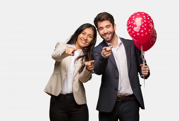 Young couple in valentines day cheerful and smiling