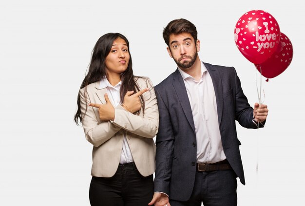 Young couple in valentines day decide between two options