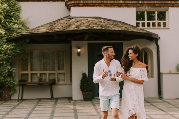 Young couple walking in the backyard