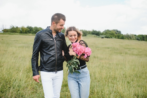 Young couple walking in the park during the spring