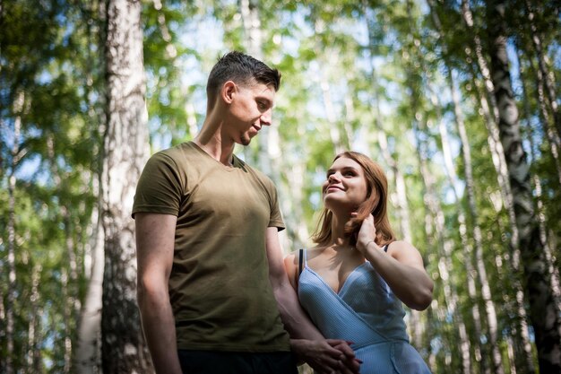 Young Couple Walking In The Park