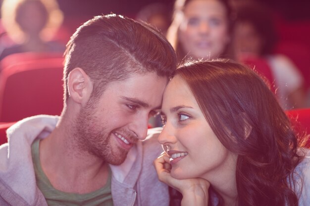 Young couple watching a film