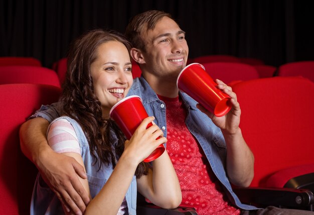 Young couple watching a film