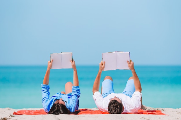 Young couple on white beach during summer vacation.