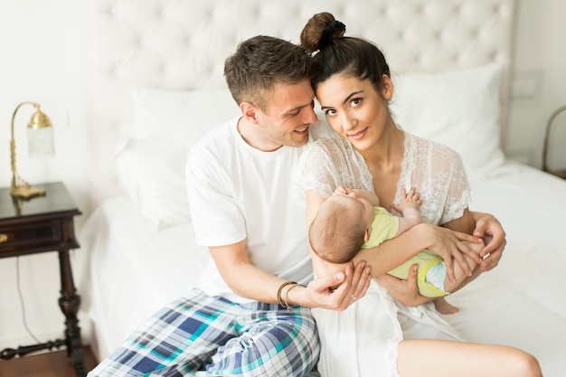 Young couple with baby girl