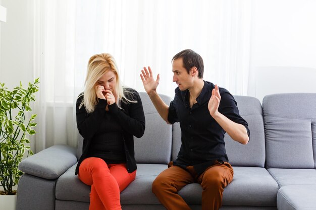 Young couple with relationship difficulties during therapy session.