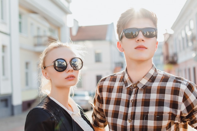 Young couple with sunglasses