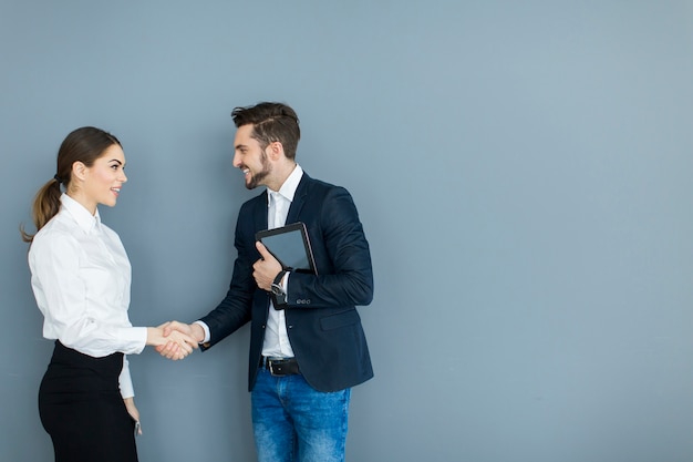 Young couple working in the office