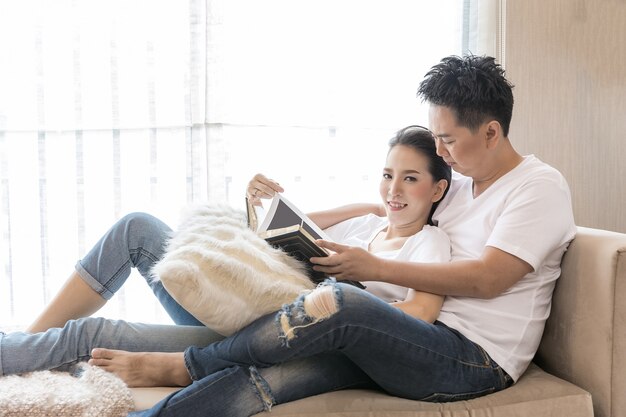 Young Couples reading book