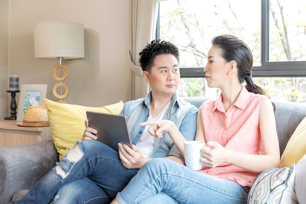 Premium Photo | Young couples using tablet