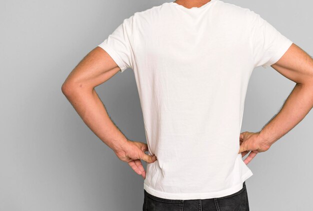 Young crazy bearded and expressive man wearung an empty blank t\
shirt mock up