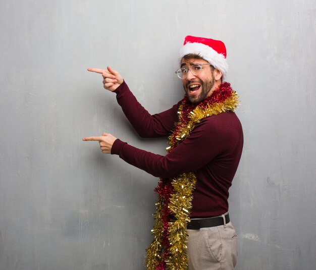 Young crazy man celebrating christmas