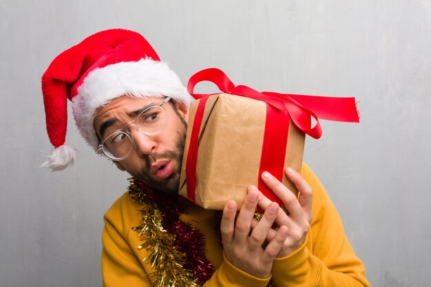 Young crazy man celebrating christmas