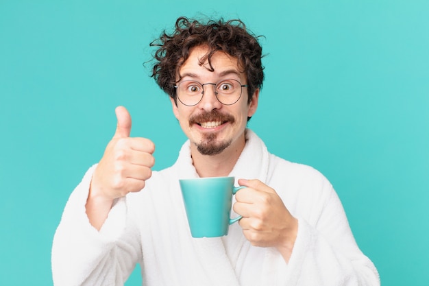 Young crazy man having a coffee