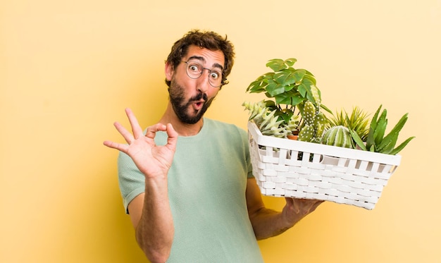 Young crazy man with plants