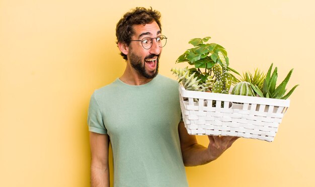 Young crazy man with plants