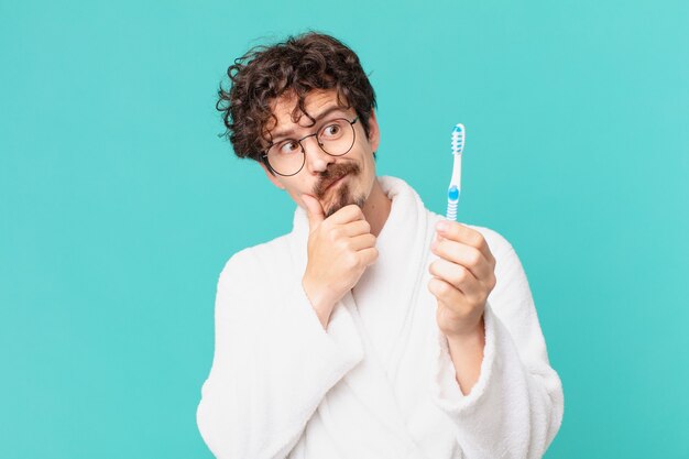 Young crazy man with a teethbrush