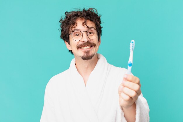 Young crazy man with a teethbrush