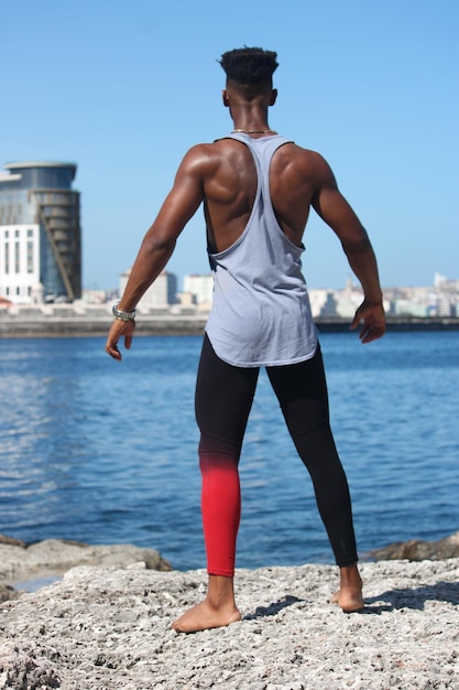 A young cuban fitness man in the coast
