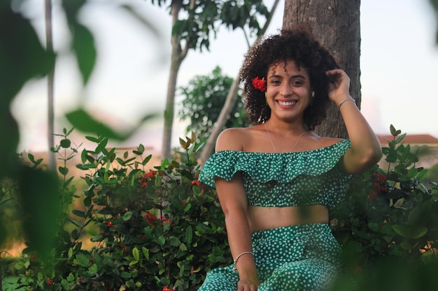 Young cuban woman in a natural park