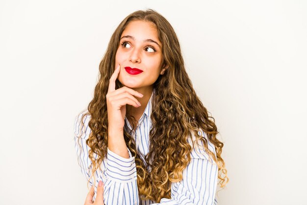 Young curly cute caucasian woman closeup face