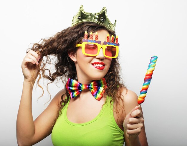 Young curly girl ready for party smile and happy