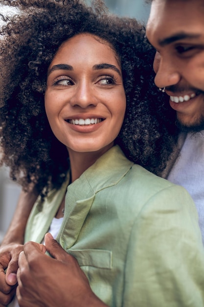Young cute couple looking happy and in love