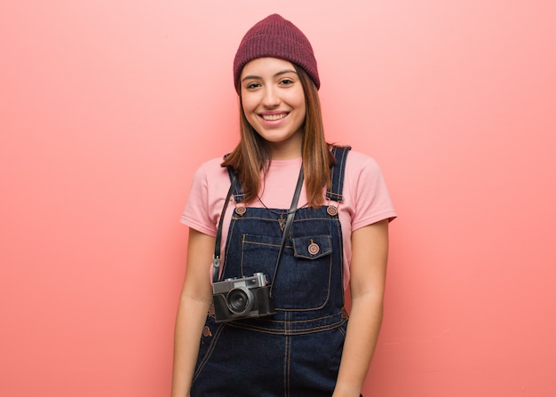 Young cute photographer woman cheerful with a big smile