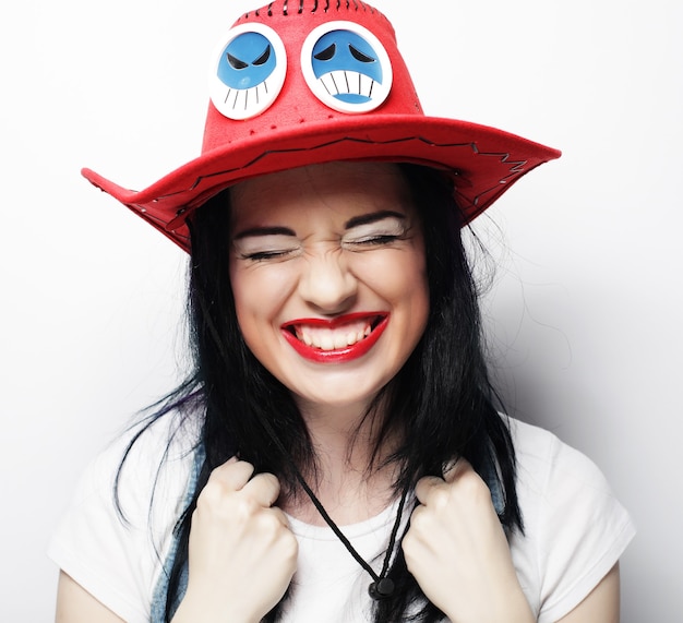 Photo young cute smiling brunette girl over white background