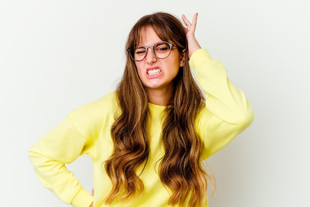 Young cute woman isolated on white wall celebrating a victory, passion and enthusiasm, happy expression