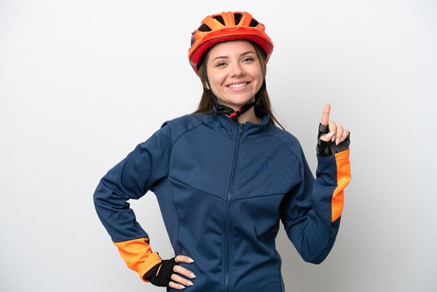 Young cyclist Lithuanian woman isolated on white background showing and lifting a finger in sign of the best