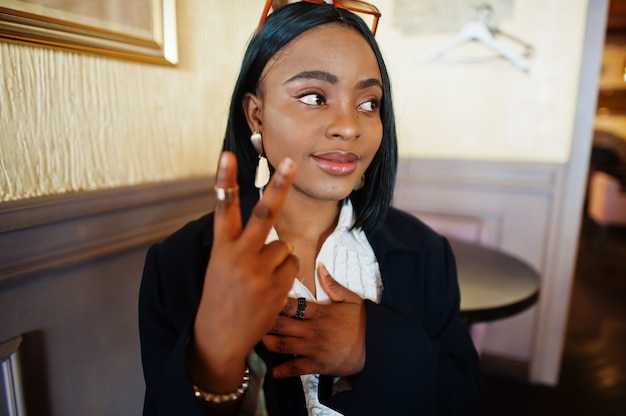 Young deaf woman using sign language