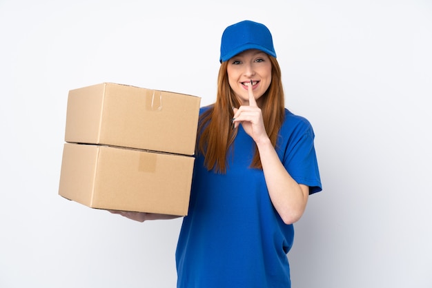 Young delivery woman doing silence gesture