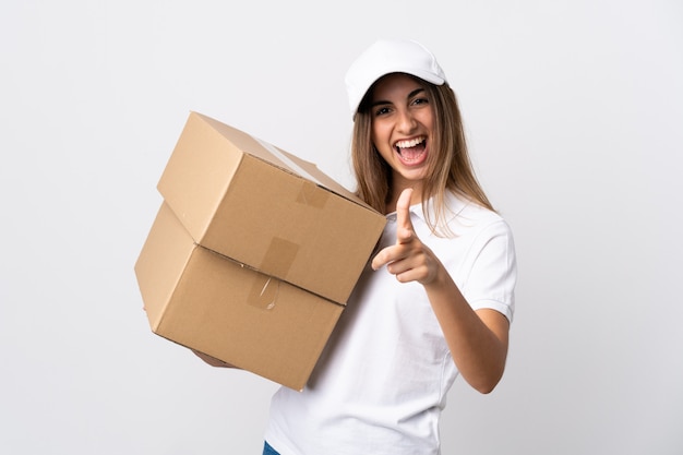 Young delivery woman holding boxes